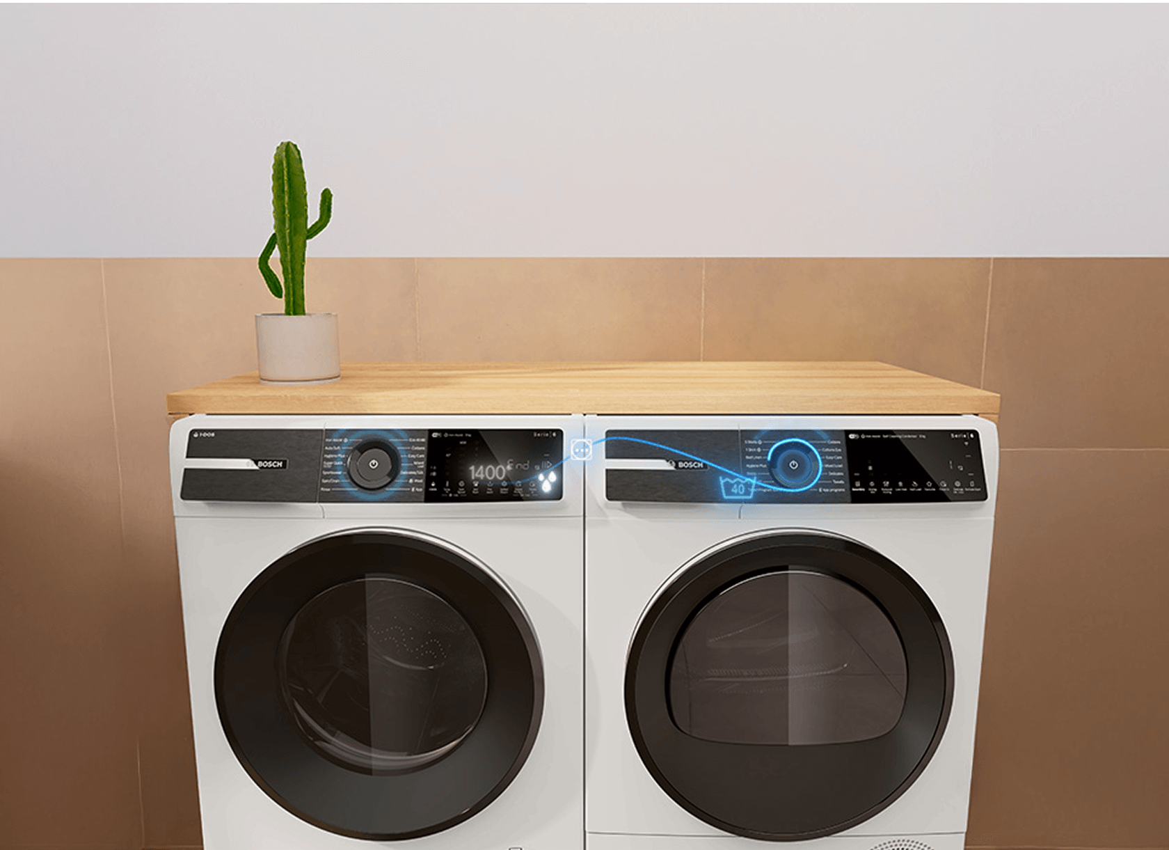 Pralka i suszarka Bosch obok siebie. Łączą się za pomocą aplikacji